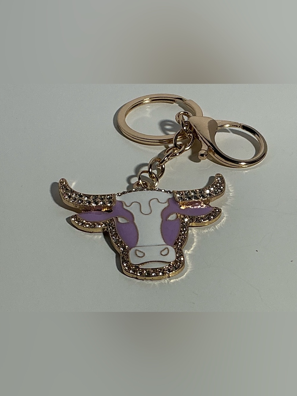 Gold Tone Cow Head Keychain with White and Lavender Enamel